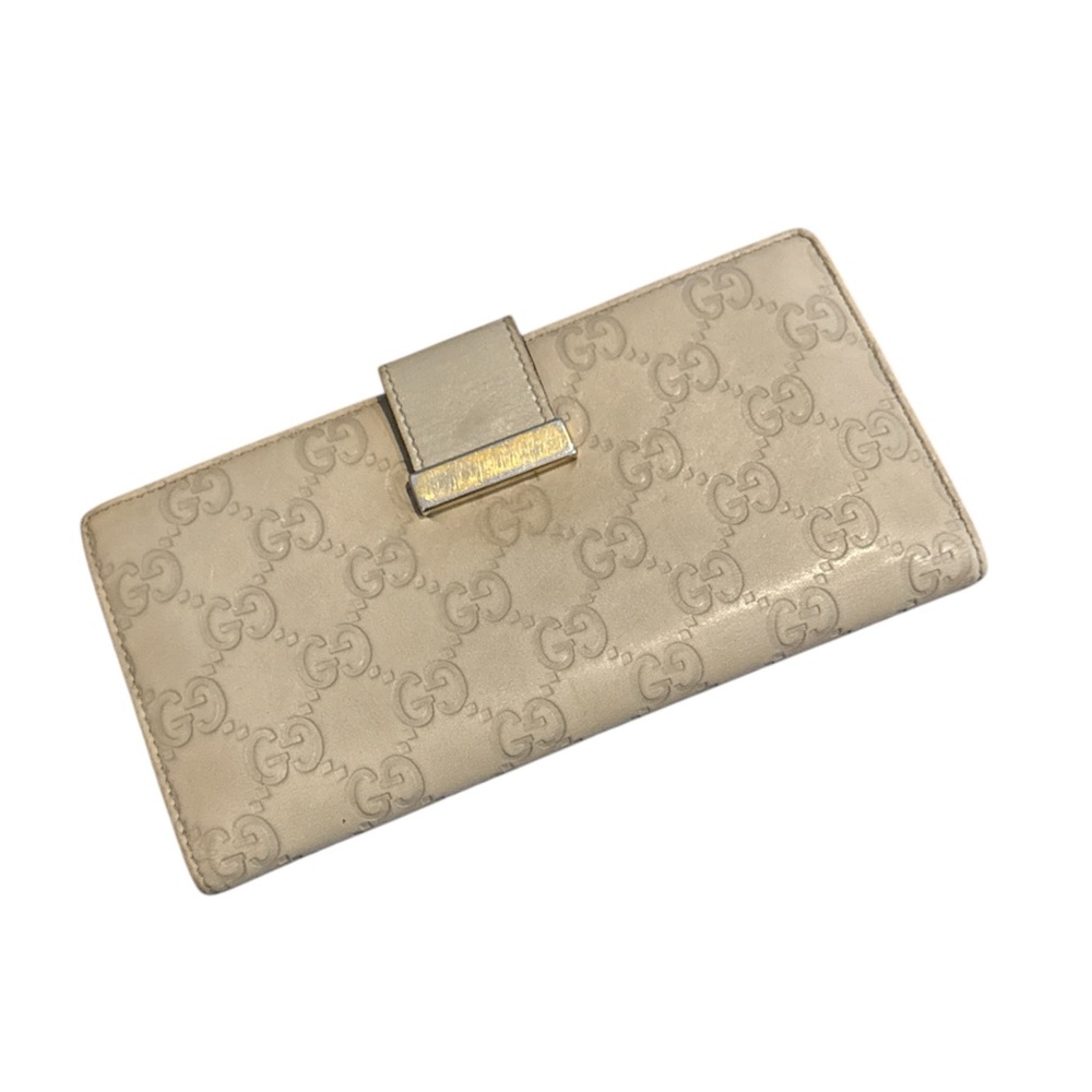 Gucci  Beige Embossed Wallet with COA included Used Condition